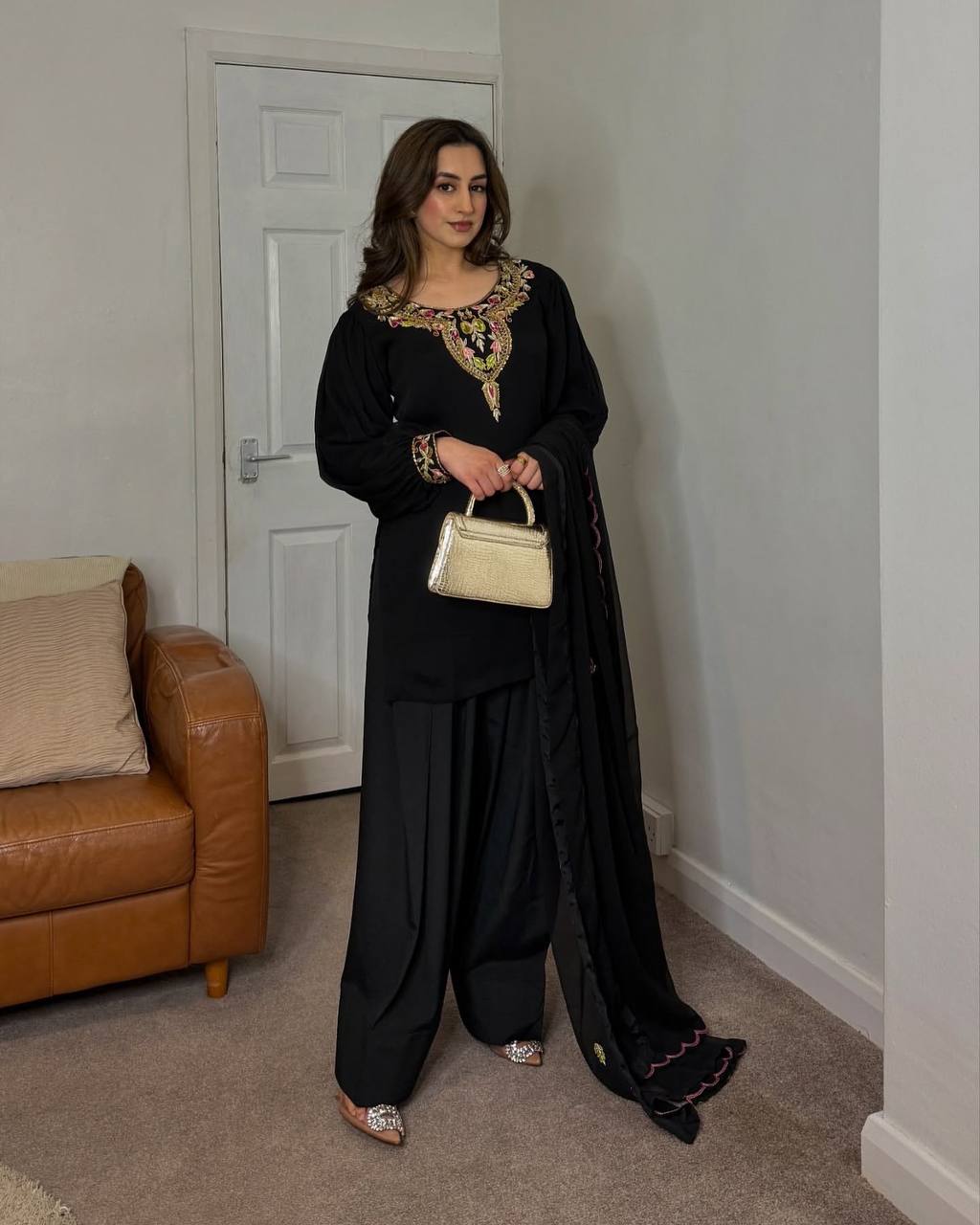 "Graceful Glamour: Timeless Ethnic Elegance in Pastel and Black Hues"