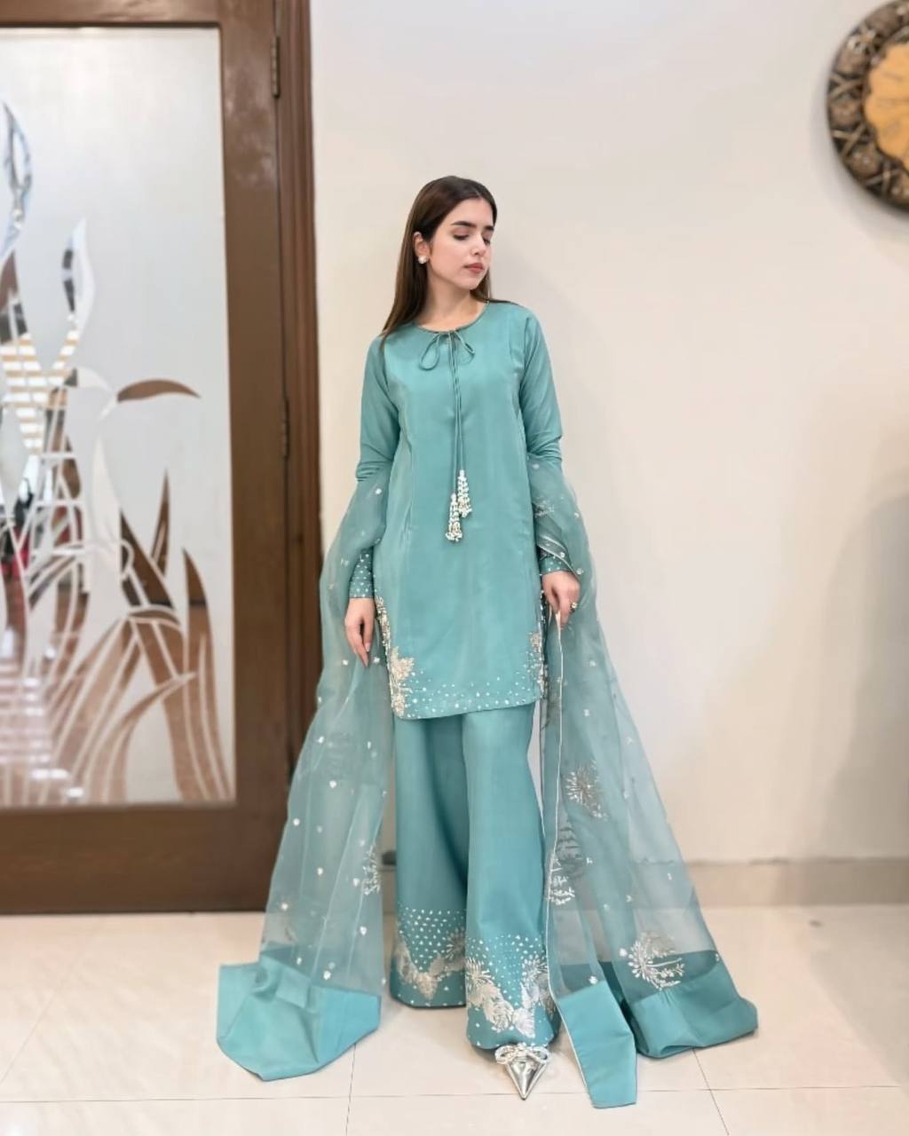Teal Elegance: Embellished Suit with Sheer Dupatta and Graceful Traditional Charm