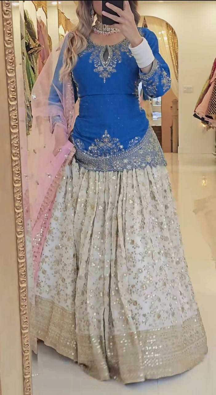 Ethereal Elegance: The Enchanting Blue and Pink Lehenga for the Modern Woman's Grand Affair