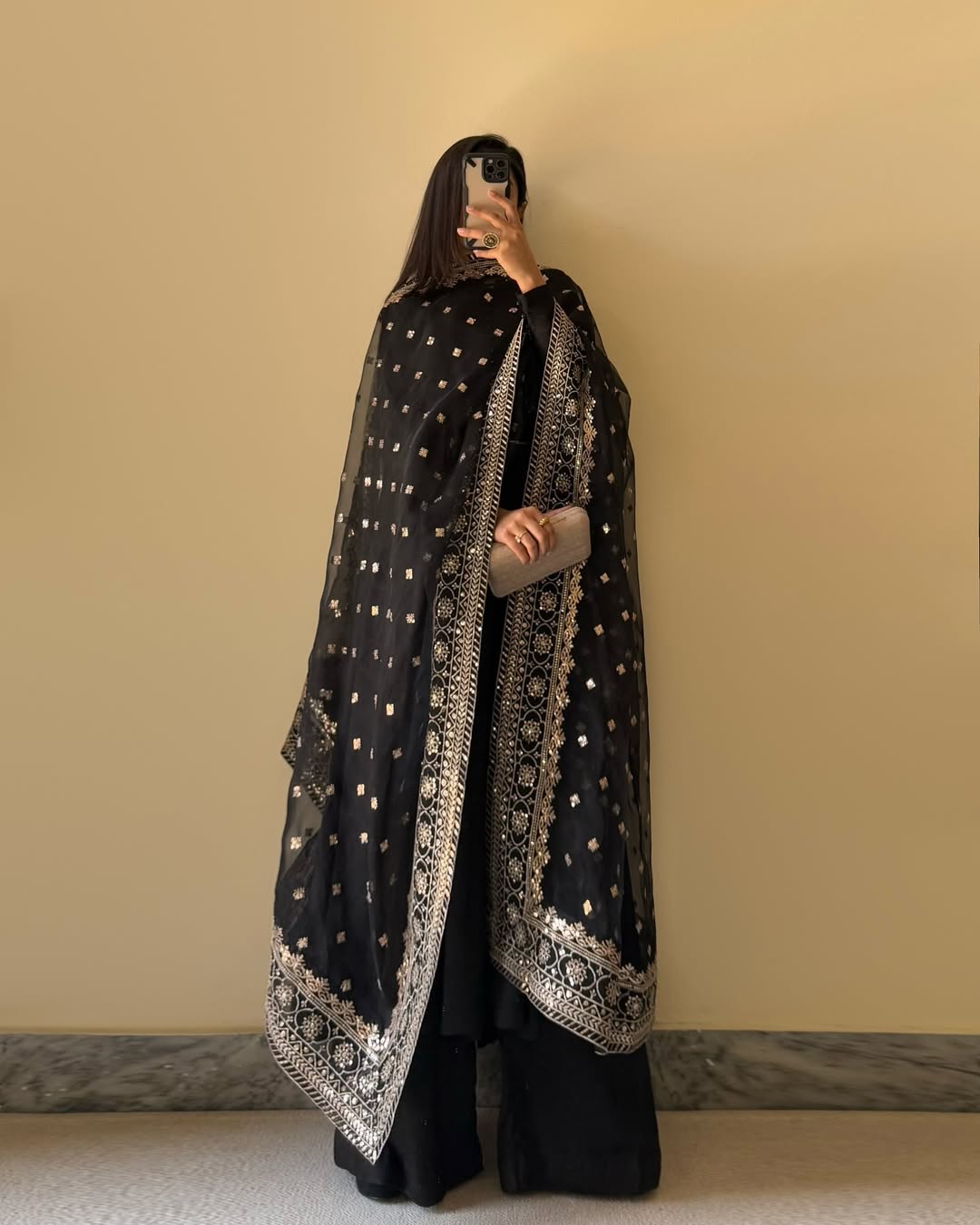 Graceful Black Anarkali Ensemble with Sheer Embroidered Dupatta Draping