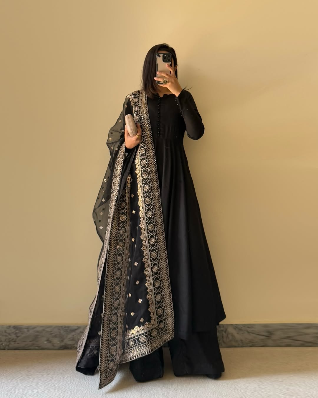 Graceful Black Anarkali Ensemble with Sheer Embroidered Dupatta Draping