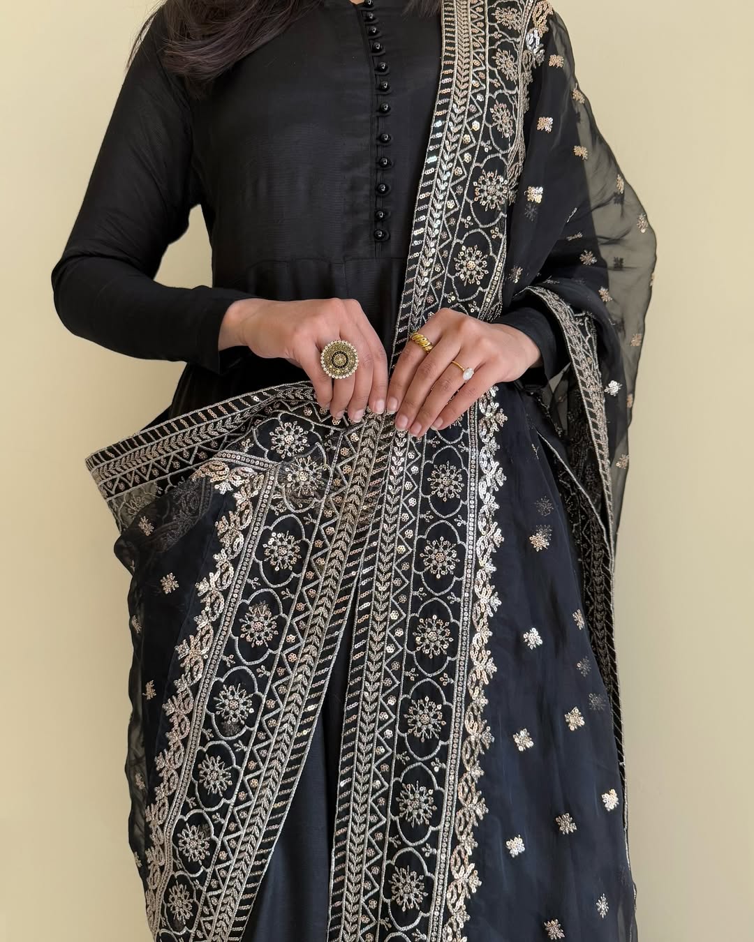 Graceful Black Anarkali Ensemble with Sheer Embroidered Dupatta Draping